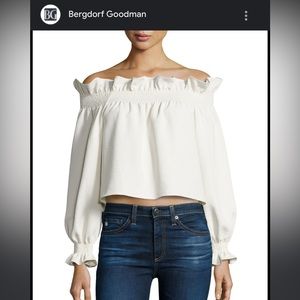 Ivory ruffled shirt. Off shoulder or on.
